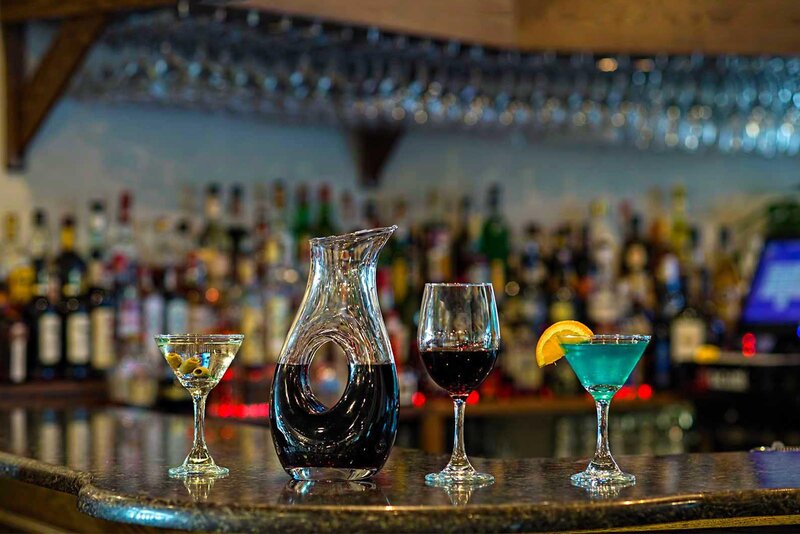 Wine and cocktails on bar top