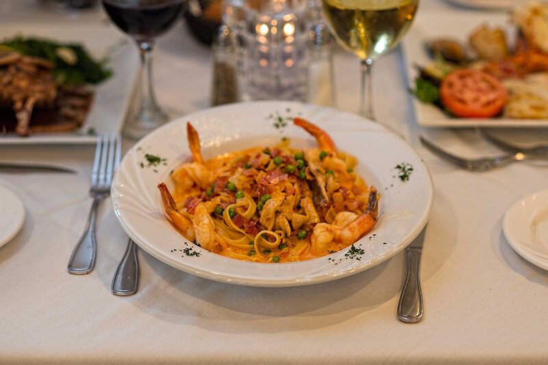 Angel hair pasta with sauteed shrimp, garlic, olive oil, fresh tomato entree